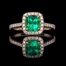 green emerald engagement ring