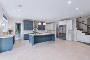 Designer kitchen, multiple en suite bedrooms, and custom woodwork throughout