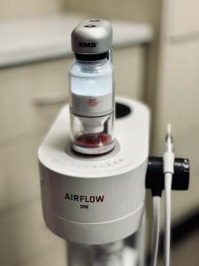 AIRFLOW® ONE for teeth cleaning using Guided Biofilm Therapy at Strathcona Dental Clinic Edmonton AB