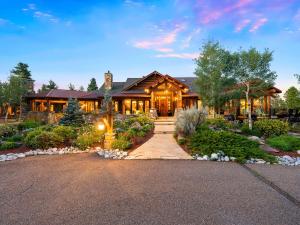 The parcel at 9141 Mountain Ranch Road features the main home and guest home, as well equestrian facilities, spread across 15.57± acres.