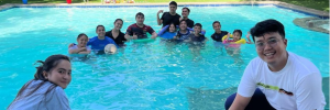 Staff members at Stepping Stone Philippines with some of their students in the pool