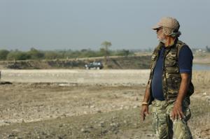 Padma Shri Savji Dholakia overseeing the Bharatmata Sarovar site in Dudhala, Gujarat, during project recce, symbolising dedication to water conservation and sustainable development.