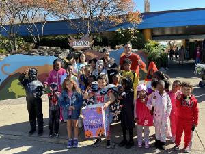 Nate Morris, Chairman and CEO of Morris Industries and 2X Game Changers Board Chair, pictured with Christopher 2X, Founder and Executive Director of 2X Game Changers, and the 2X Game Changers Zoo Buddies participants at the Louisville Zoo.