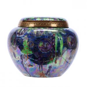Malfrey pot marked Wedgwood Fairyland Lustre in the Bubbles pattern, 7 ½ inches tall, has an incredible lid and a design that features a spider and web with a trapped fairy (est. $10,000-$15,000).