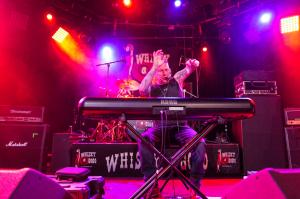 Michael-Jon Lazar of TWOFEW captivates the crowd at Whisky A Go Go, delivering an intense and passionate rock performance.