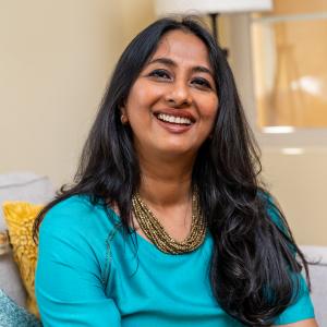 Portrait of Vandana Sinha, a dedicated Quantum Energy Healing expert and meditation guide, known for her transformative healing sessions and deep spiritual guidance.