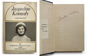 Lot #2 is a first edition copy of the book, Jacqueline Kennedy: A Biography, signed by Jackie in bold black ink on the first free endpaper (est. $1,250-$1,500).