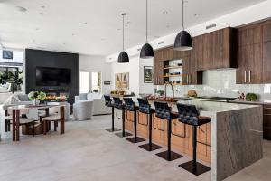 Chef’s kitchen with hidden second kitchen for entertaining