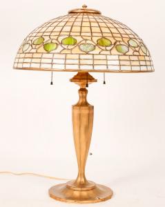 Authentic Tiffany Studios (N.Y.) three-bulb table lamp with leaded glass Acorn design shade and gilted bronze base, like new, in immaculate condition, zero flaws (est.$20,000-$50,000).