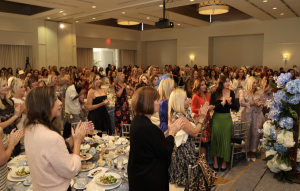 picture of ladies in the room Over 290 guests came together to support Miracles for Kids’ mission to provide stability for low-income families with critically-ill children.