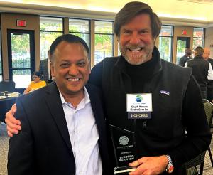 Lokesh Sikaria, Founder & General Partner, Moneta Ventures LLC, Folsom, Calif. presenting the Sacramento Business Jounral Inno Award to Chuck Hansen, Chairman & CEO, Electro Scan Inc.