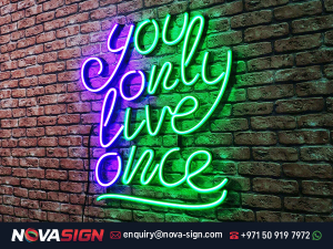 YOLO Blue and Green Light Neon Signage by Nova Sign in Dubai