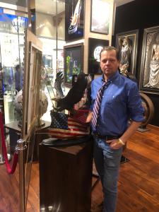 Laran standing proudly with his creation, Spirit of America