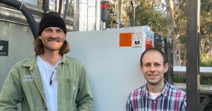 Luke and Chet in front of JuneShine's CO2 recovery plant