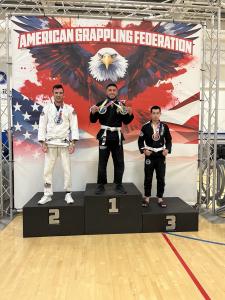 Josh MacDonald BJJ gi American Grappling Federation competition.