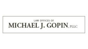 The Law Offices of Michael J. Gopin, PLLC Logo