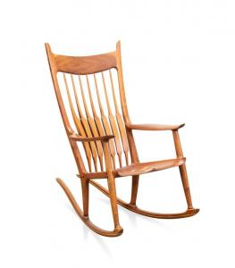 Walnut and mixed wood “His” rocking chair by Sam Maloof (American, 1916-2009), executed in 1988 and signed, dated and numbered 44 to the underside of the seat ($20,570).