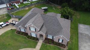 An overhead drone picture of a finished roof in birmingham, al