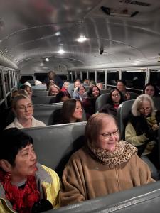 Church members riding the donated Durham bus during their Women’s Christmas House Tour event.