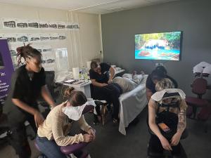 Woman giving chair massage