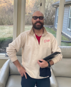  J. Blanton Plumbing technician working on a plumbing system to address basement flooding risks, showcasing the company’s expertise in 24-hour plumbing services and basement waterproofing for Chicagoland homes.