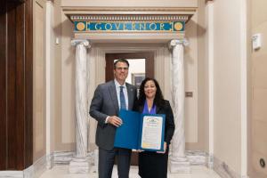 Photo: Veteran Voices For Fibromyalgia’s website Team Member, Sutra Borgeson, meets with Oklahoma Governor Kevin Stit, to receive a Proclamation for Fibromyalgia Awareness Day