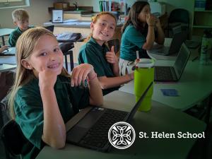 St. Helen Catholic school students smile in classroom