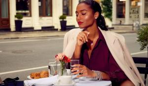 Woman wearing cluster earrings & cluster necklace from the Cluster Diamond Jewelry collection by With Clarity