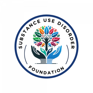 Sudstance Use Disorder Foundation Logo, Colorful hands holding up a bright multicolored tree symbolizing recovery and new growth
