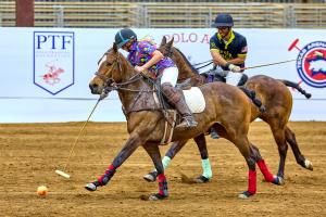 two arena polo players on horses during Texas Arena League play