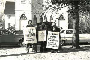 Protestors at Jimmy Carter's church call for broader amnesty for opponents and victims of the Vietnam War