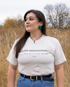 Elena Esparza of Wonderstate Coffee wears the Makade-Mashkikiwaaboo t-shirt.