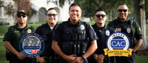 A group of five Ontario Police Department officers smiling in uniform, accompanied by the Ontario Police Department logo and the IBCCES Certified Autism Center™ badge.