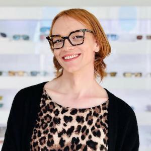 Pictured: Austra, the frame buyer at Oculus Eyecare, models tortoise cat-eye frames from Anne & Valentin.