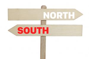 Sign / North or South