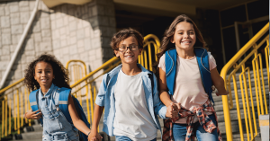 3 children playing at school together