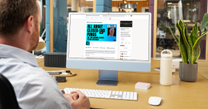 White, middle-aged man looking at a desktop showing a preview of the RMS Income Investing Community