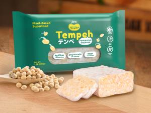 Image of Royal Tempeh blocks neatly packaged, showcasing the brand's logo and product. The tempeh has a firm, textured appearance, highlighting its plant-based, protein-rich qualities.