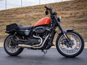 A Harley-Davidson Sportster motorcycle equipped with a Sawicki Speed exhaust system.