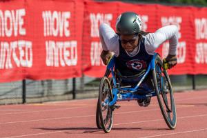 A wheelchair racer competing on the track