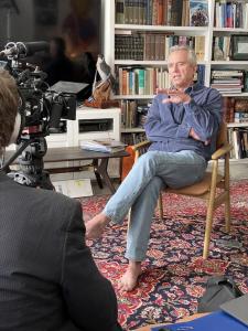 a photo of RFK Jr. in front of a camera