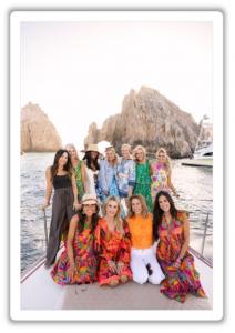 Image of the influencers who attended the Avara brand trip posing on the boat ride.