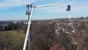 Alpha Platforms Lifting An Antenna