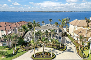 Elegant estate in Gulf Harbour Yacht & Country Club with Caloosahatchee River views, private beach access and world-class amenities for luxury living.