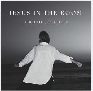 The cover shows, in black and white the back of Meredith looking out on the ocean, at twilight, hands relaxed and slightly out to sides holding on a railing as we hold on the Lord for our strength in all things