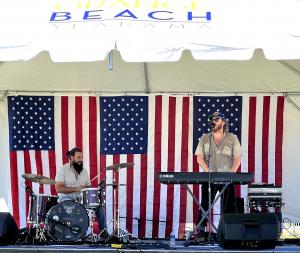 Musicians playing on festival stage