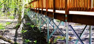 Boardwalk construction using Steel Helical Piers and Wood Decking