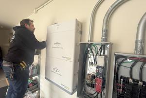 Our lead technician, Jesse, is in the process of installing a new battery backup system