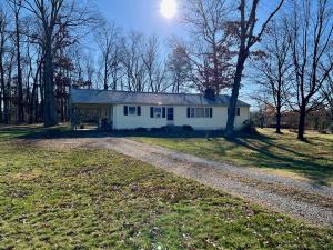 3 BR/2 BA ranch/rambler style home on 1± acre lot in Fauquier County, VA • This home measures 1,596± finished sf. and features an eat-in kitchen (all appliances convey), living room w/gas log fireplace, dining room, attic & attached car port