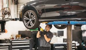 A Certified BMW Technician Works on a vehicle at BMW Cleveland in Solon, Ohio.